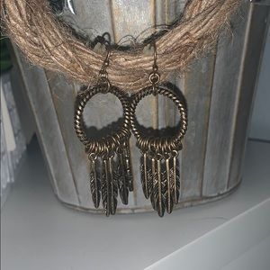 Dream catcher hanging earrings.